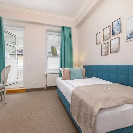 Отель Strandhotel Zur Promenade Остзебад Бинц